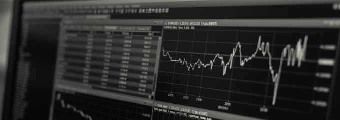 Line graphs on a dark computer screen